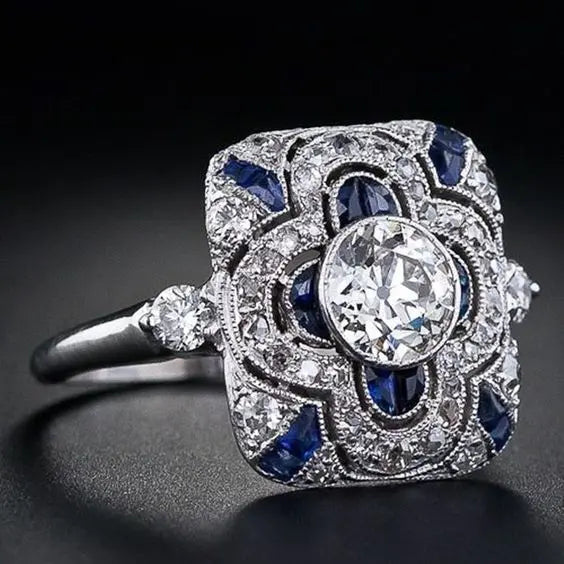 Vintage zilveren ring met blauwe zirkonia