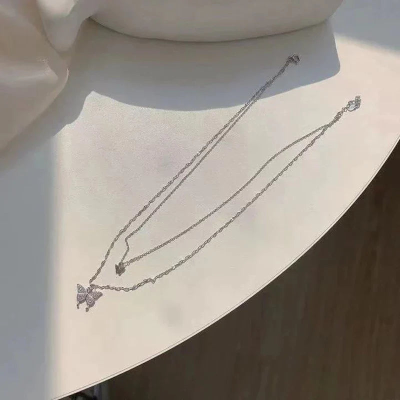 Refined Silver Necklace Set with Shiny Butterfly