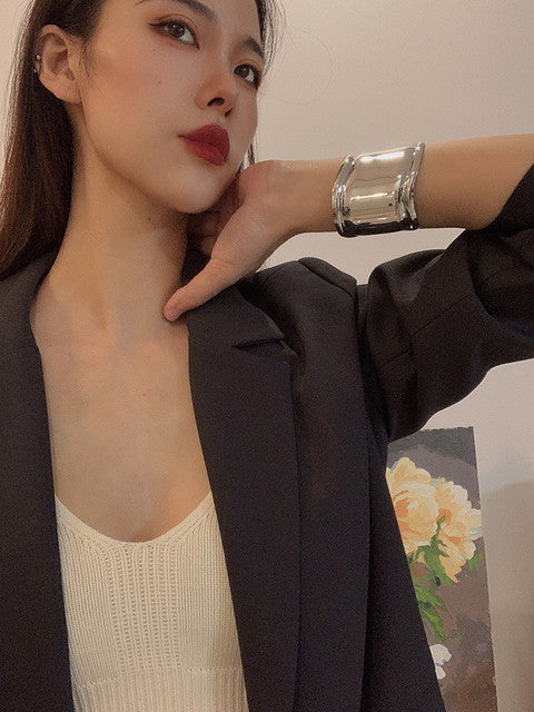 Bracciale Esagerato – Golf Audace in Asimmetria Elegante