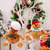 Peperkoekman zittend pop kerstboom hanger