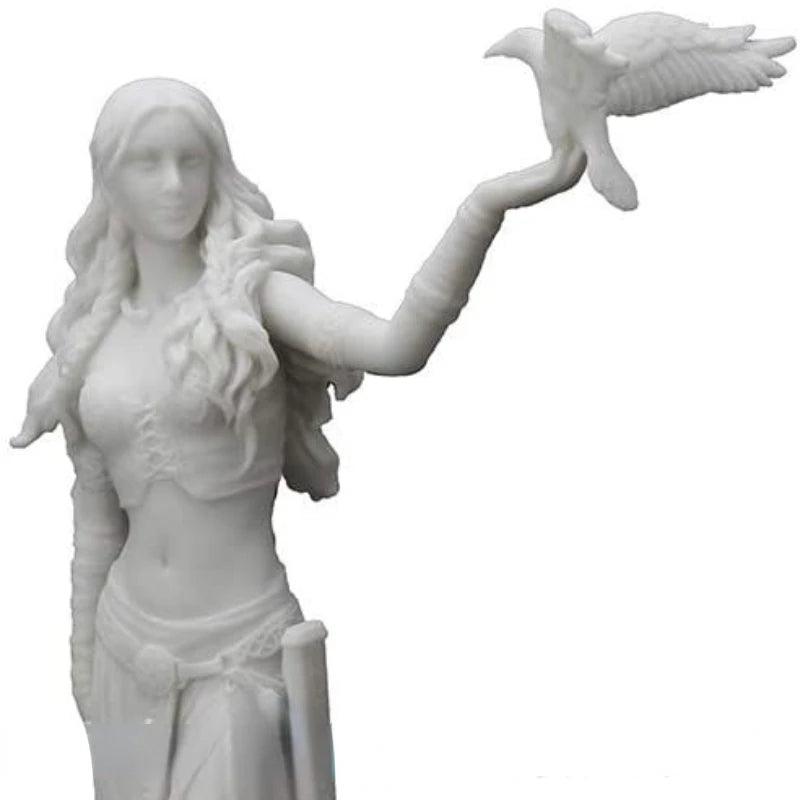 Goddess figurine with crow and sword