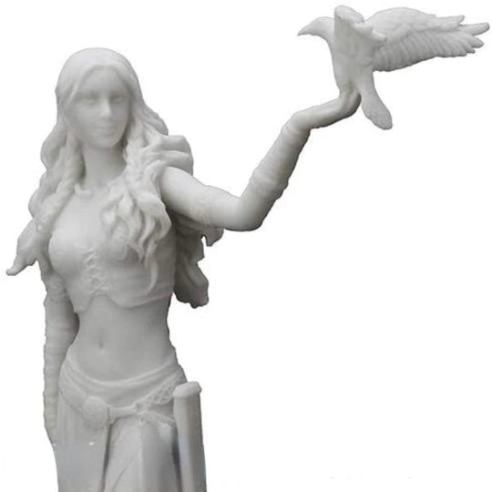 Goddess figurine with crow and sword