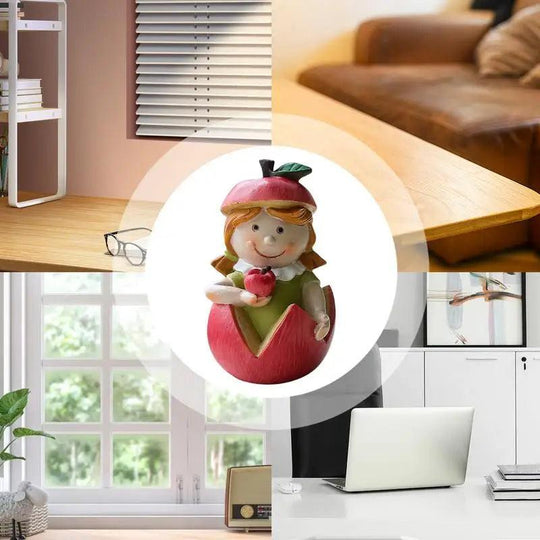 Cute figurine of a girl in resin with fruit motif