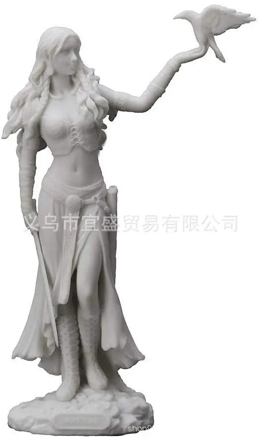Goddess figurine with crow and sword