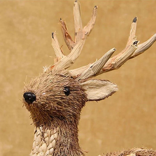 Ornament with straw head and moose