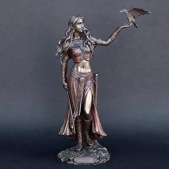Goddess figurine with crow and sword