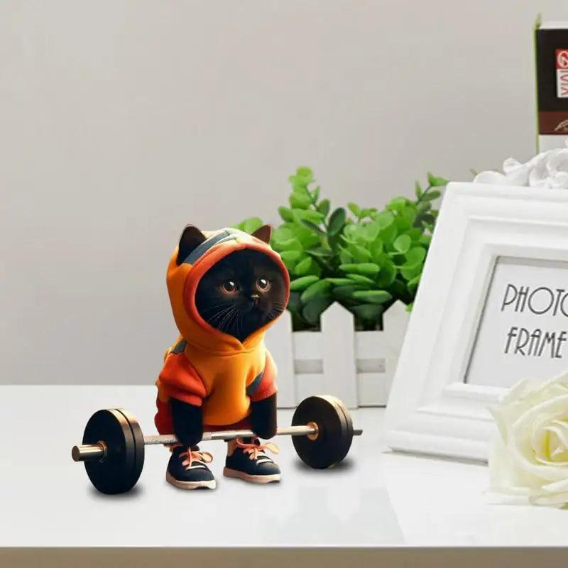 Sculpture of weightlifter cat