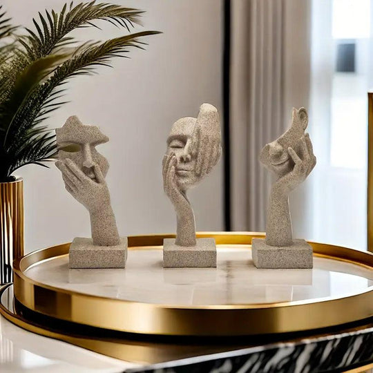 Ensemble de 3 sculptures abstraites en résine de grès