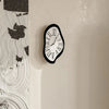 Surrealistic Wall Clock with Roman Numerals