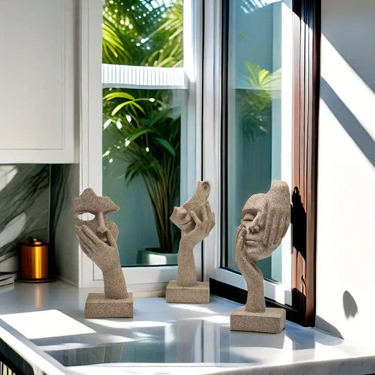 Ensemble de 3 sculptures abstraites en résine de grès