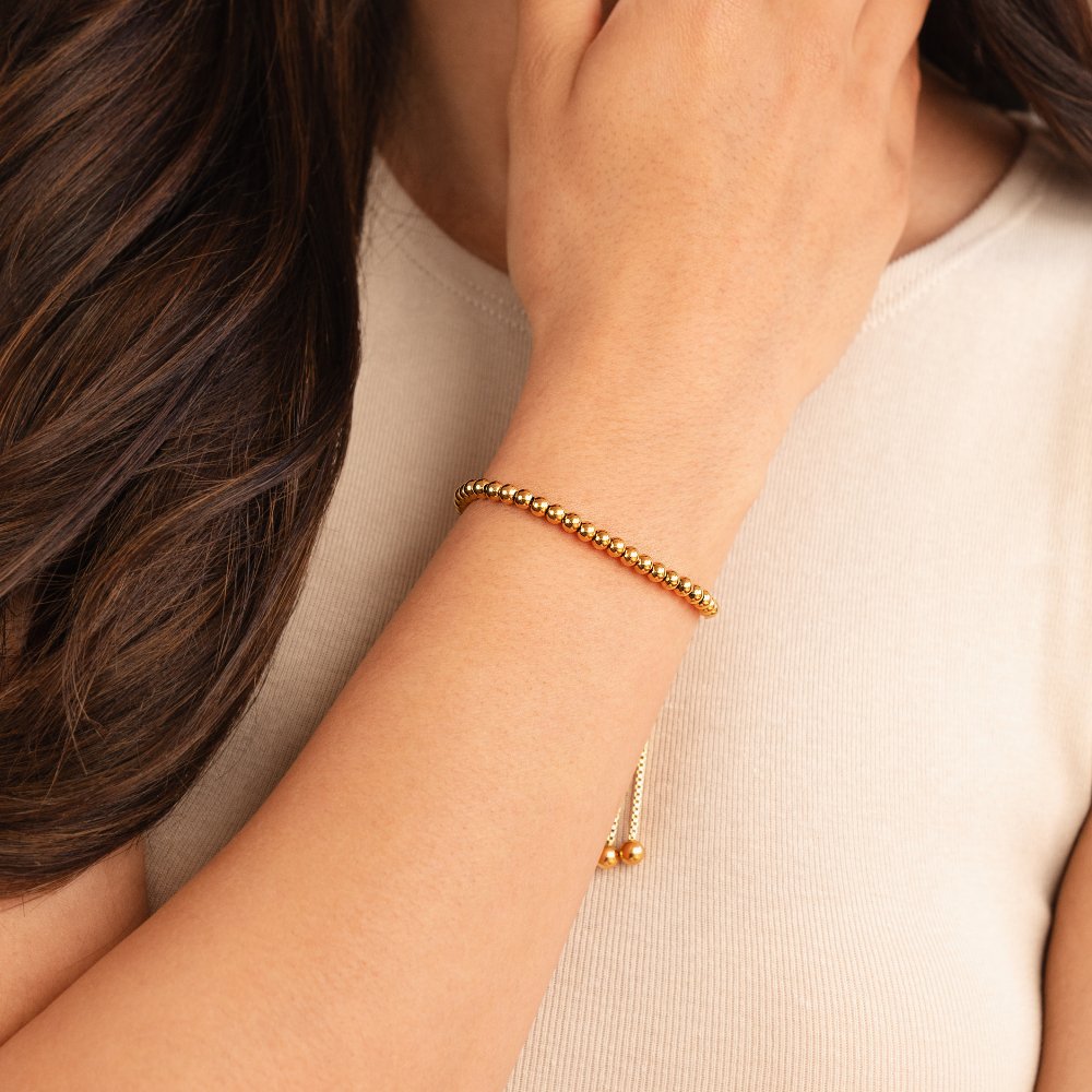 Golden bracelet with beads