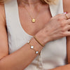 Golden bracelet with beads