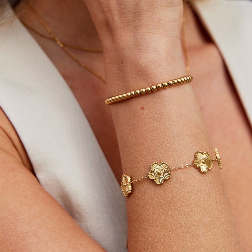 Golden bracelet with beads