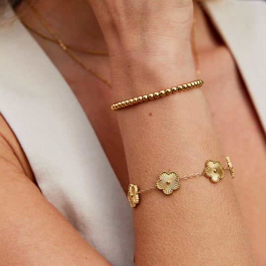 Braccialetto d'oro con perline