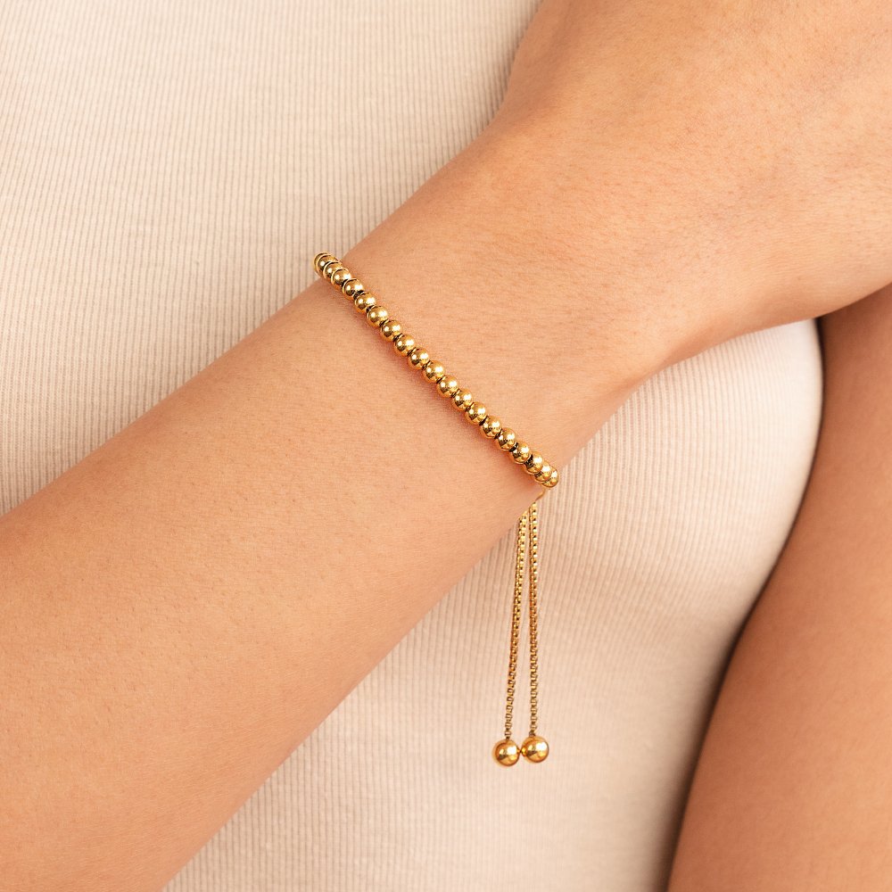 Golden bracelet with beads