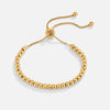 Golden bracelet with beads
